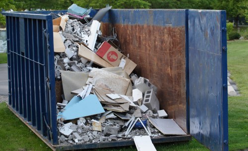 Workers loading separated recyclables at a Westminster property